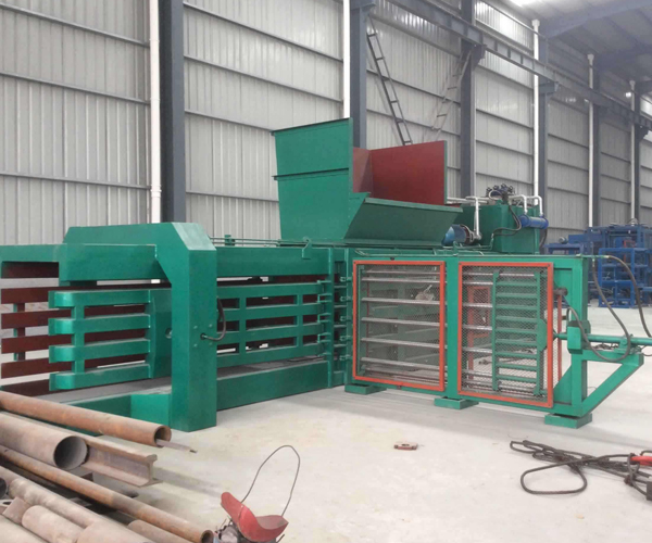 Waste paper baler